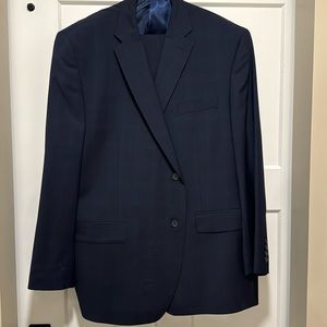 Calvin Klein suit. Navy blue. New w/o tags. Says 46R, but it fits like a 48R.